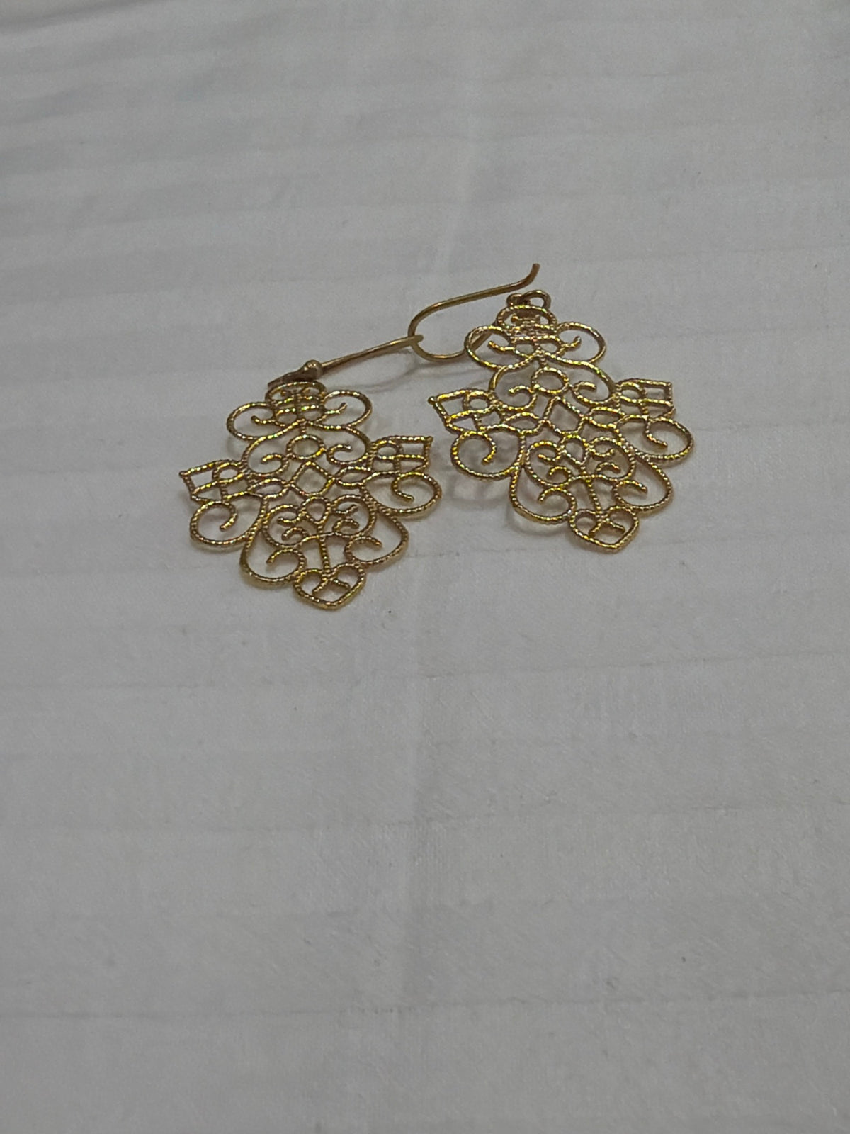 Nomi AM-35 — gold tone