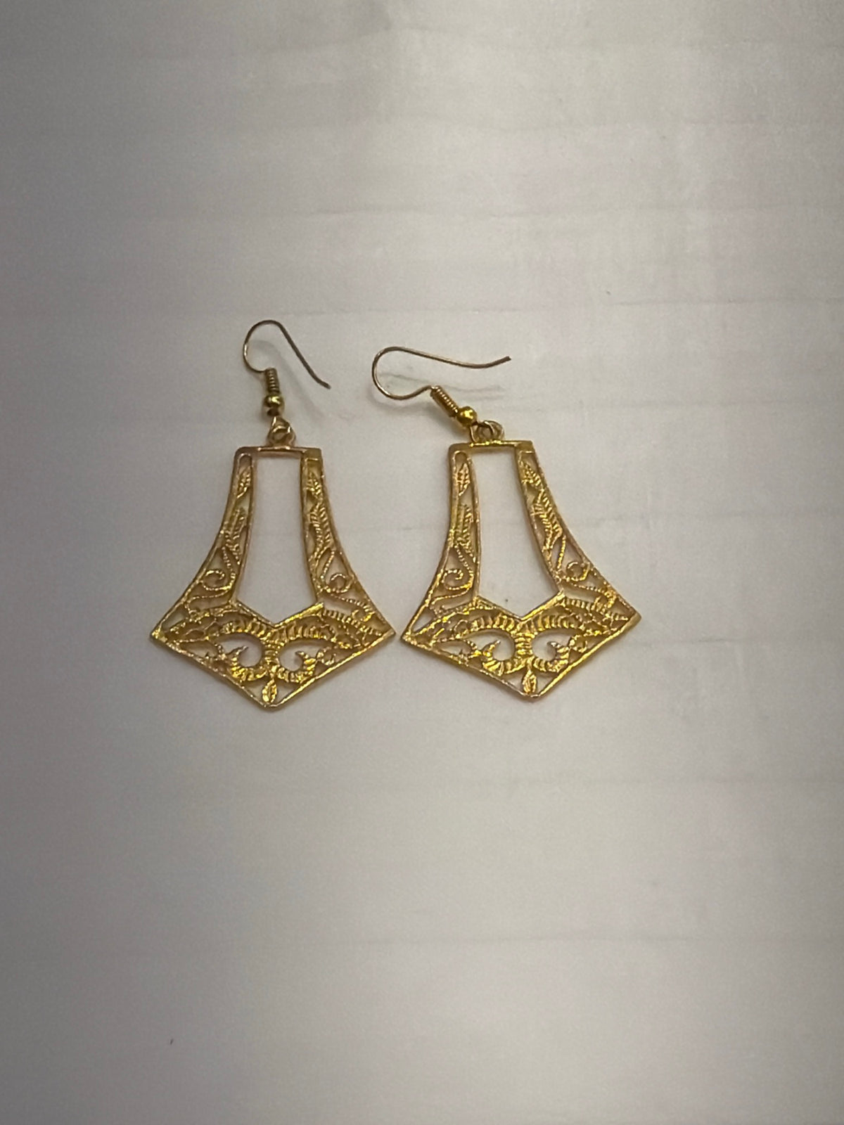Nomi AM-41 — gold tone