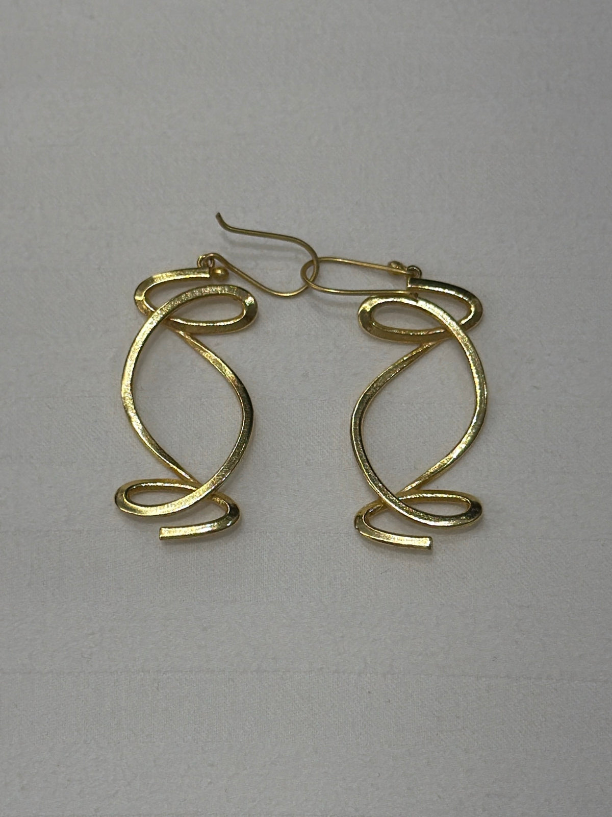 Nomi AM-44 — gold tone