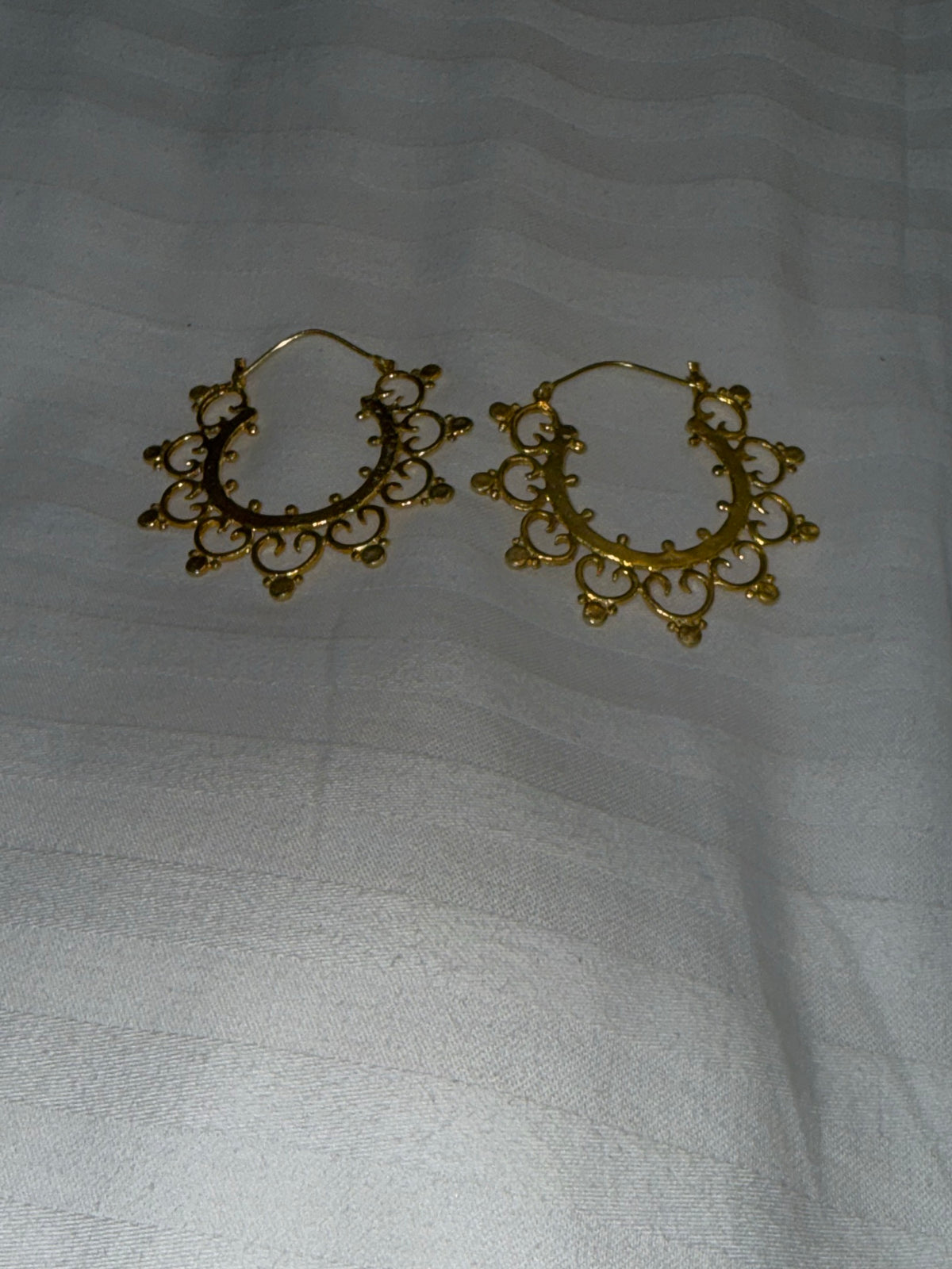 Nomi AM-49 — gold tone