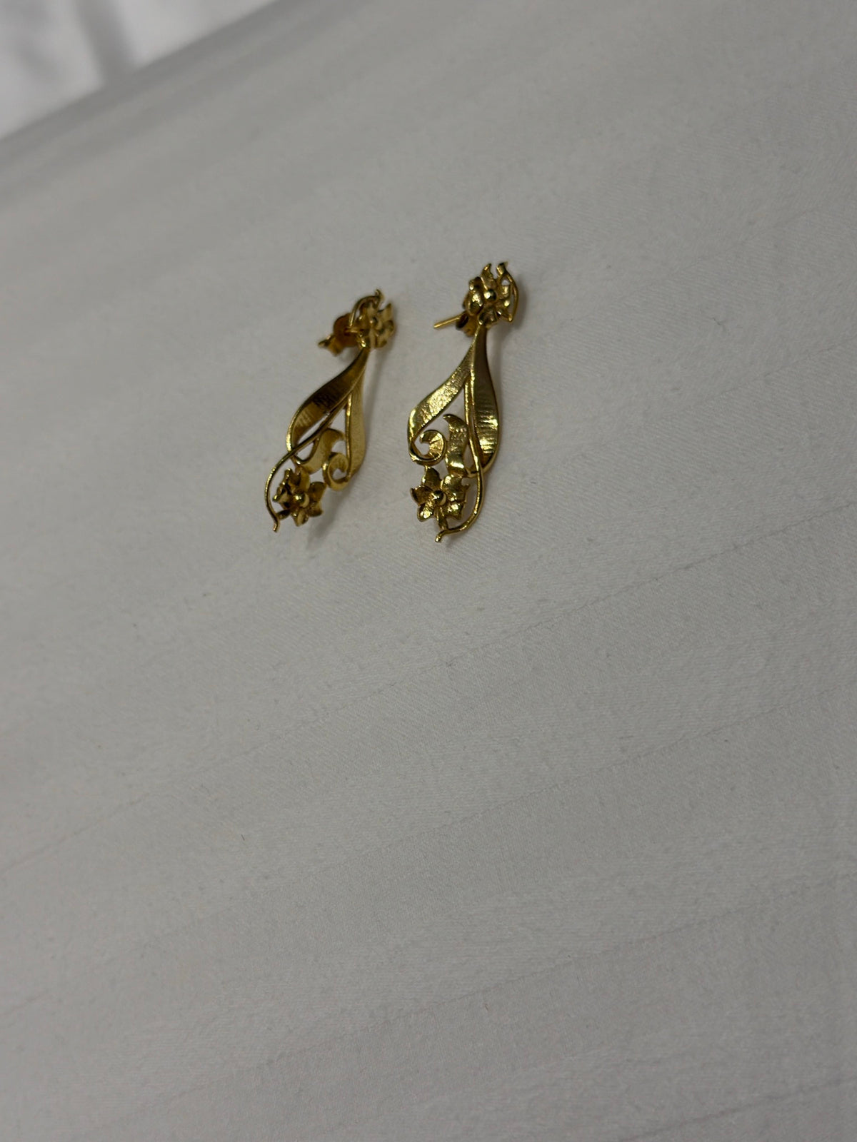 Nomi AM-51 — gold tone