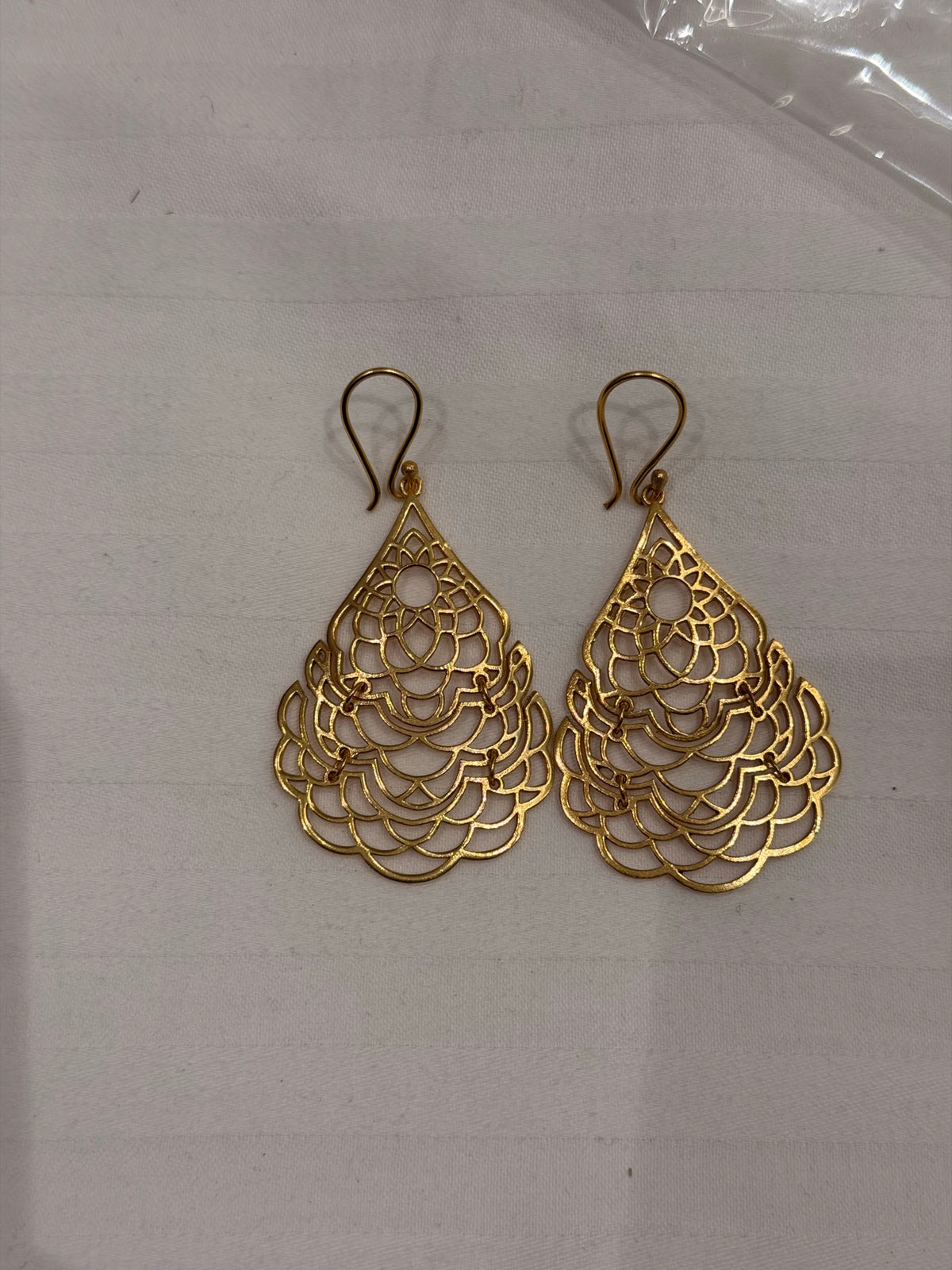 Nomi AM-08 — gold tone