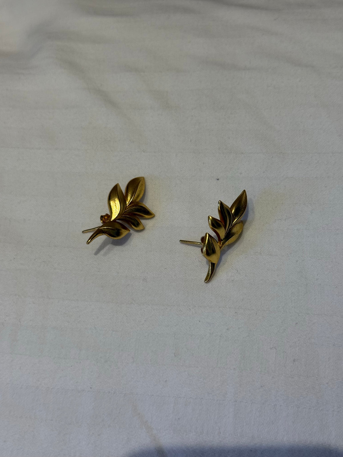 Nomi BM-06 — gold tone