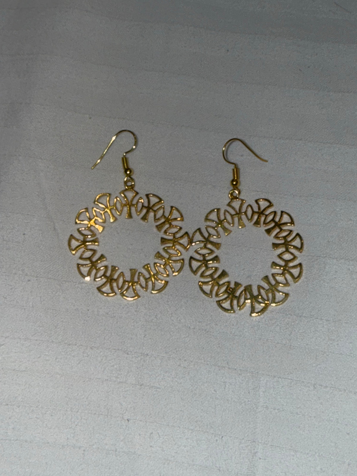 Nomi AM-13 — gold tone