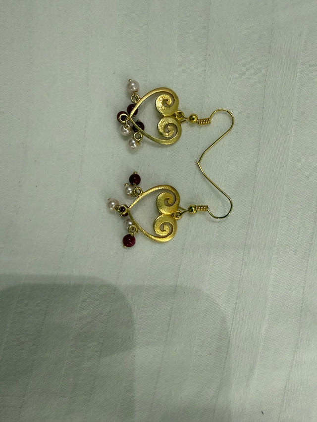 Nomi AM-19 — gold tone