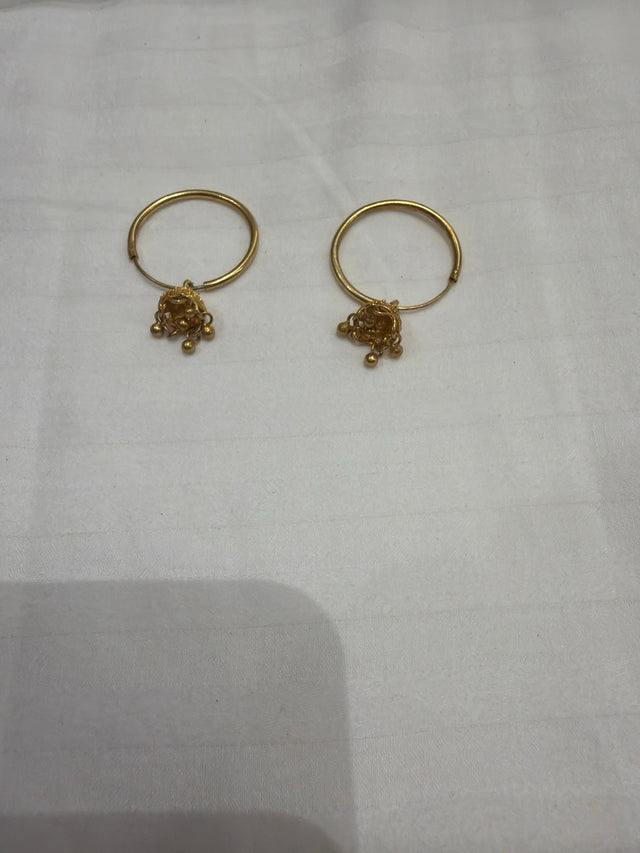 Nomi AM-20 — gold tone