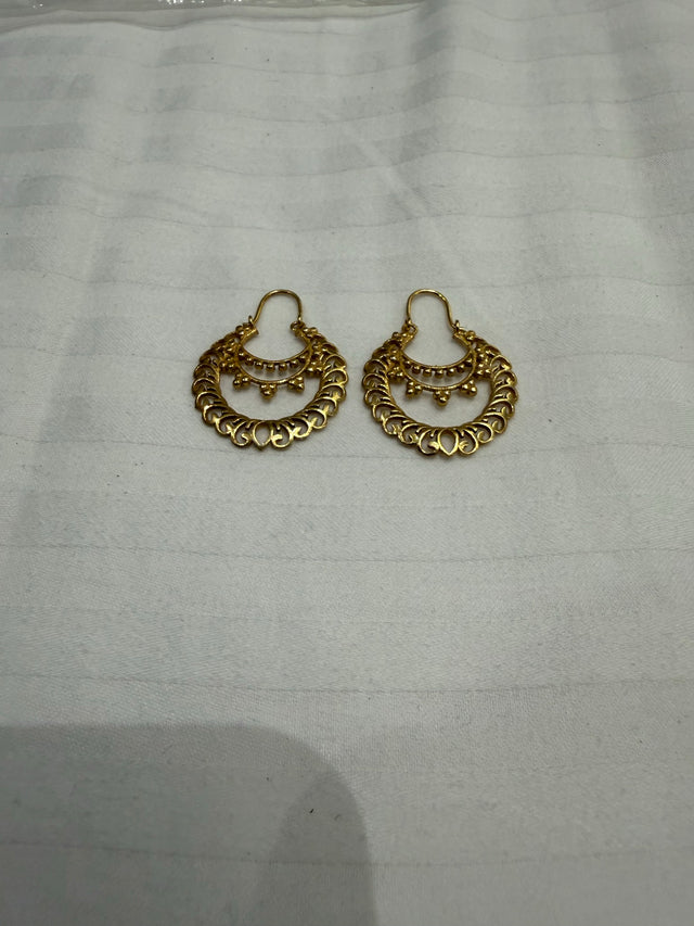 Nomi AM-27 — gold tone