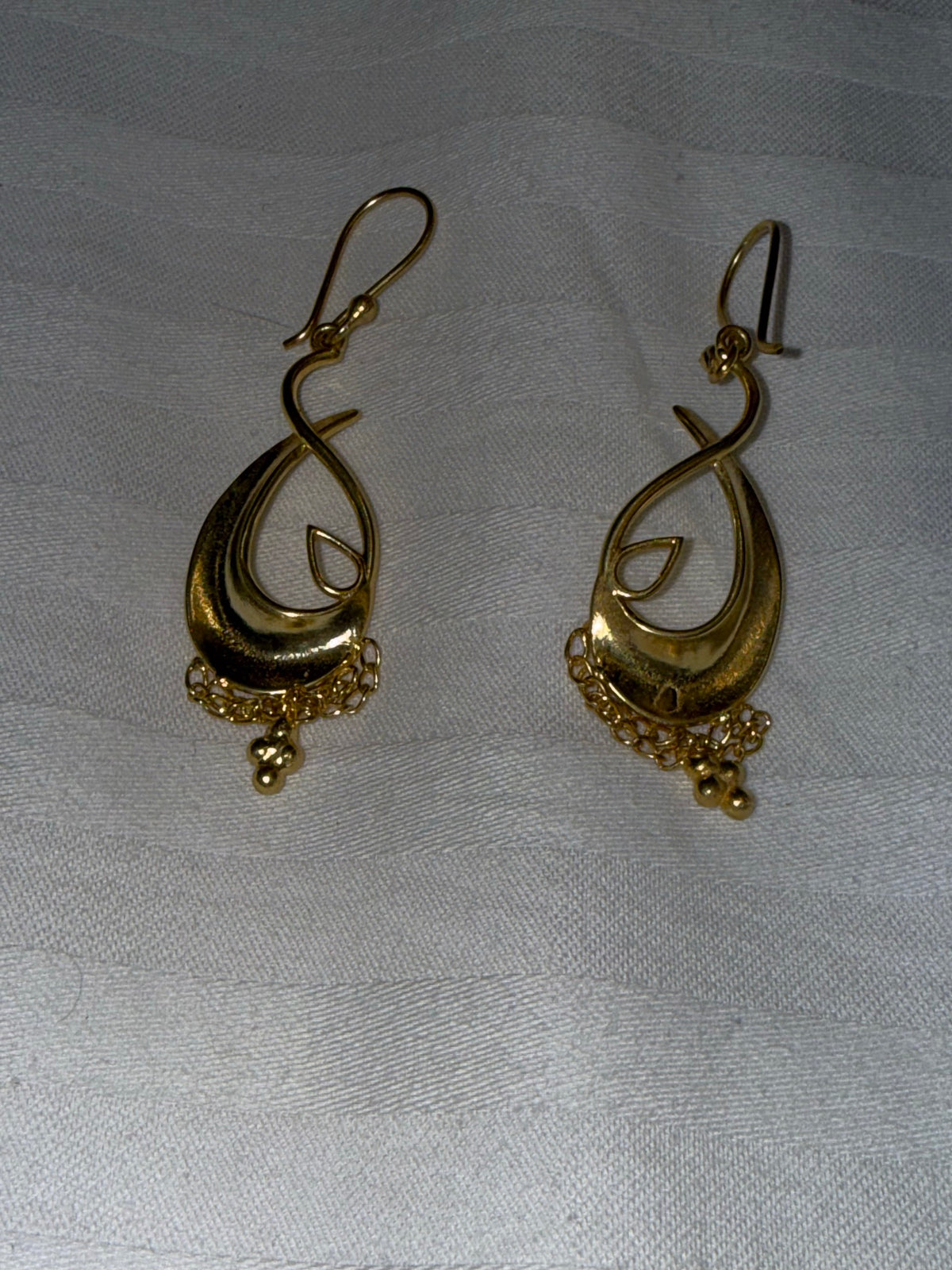 Nomi AM-03 — gold tone