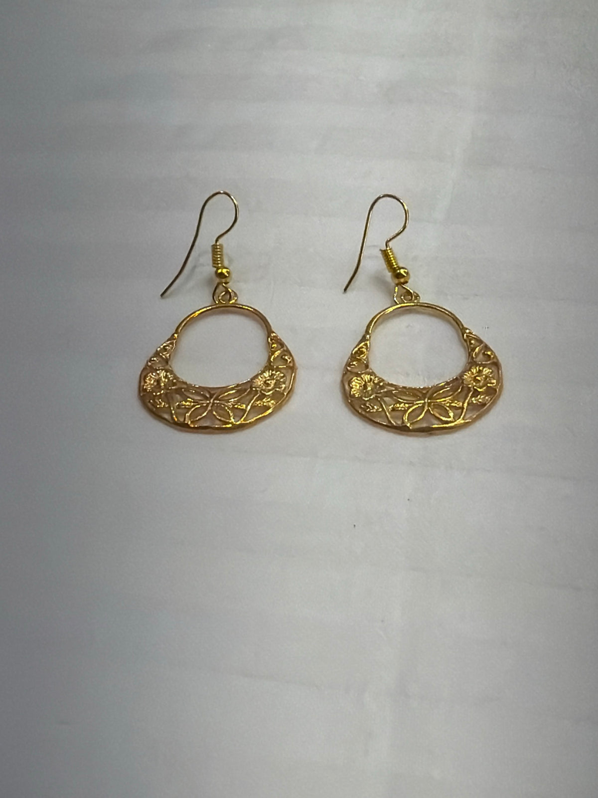 Nomi AM-31 — gold tone