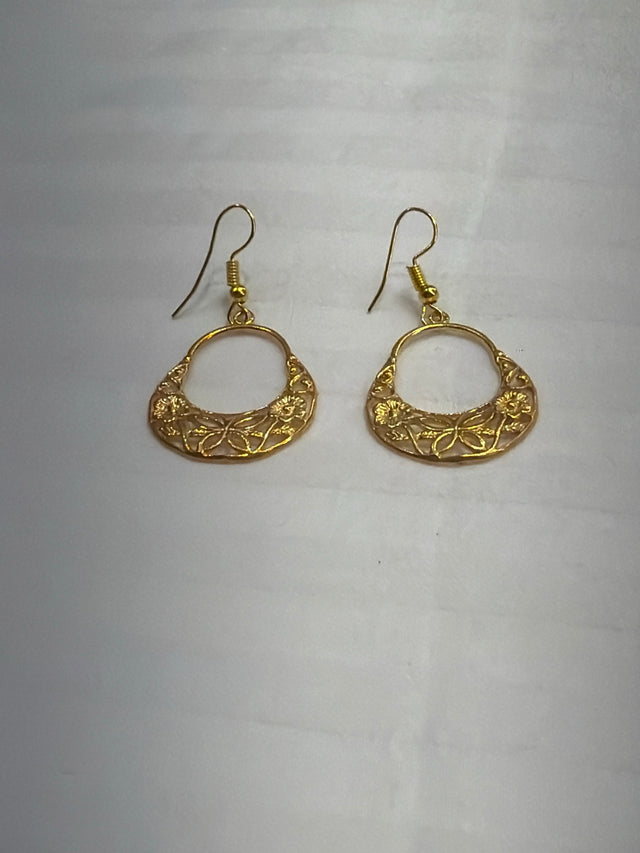 Nomi AM-31 — gold tone