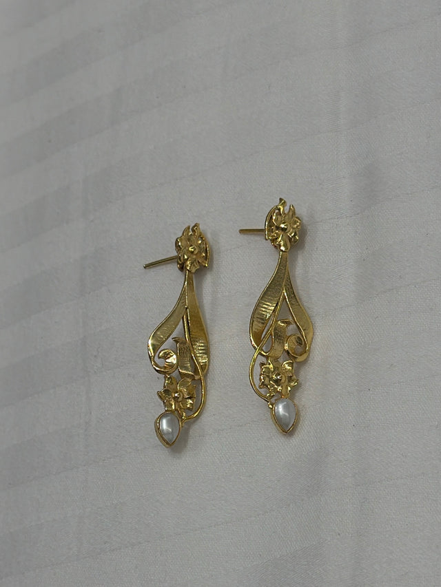 Nomi AM-33 — gold tone