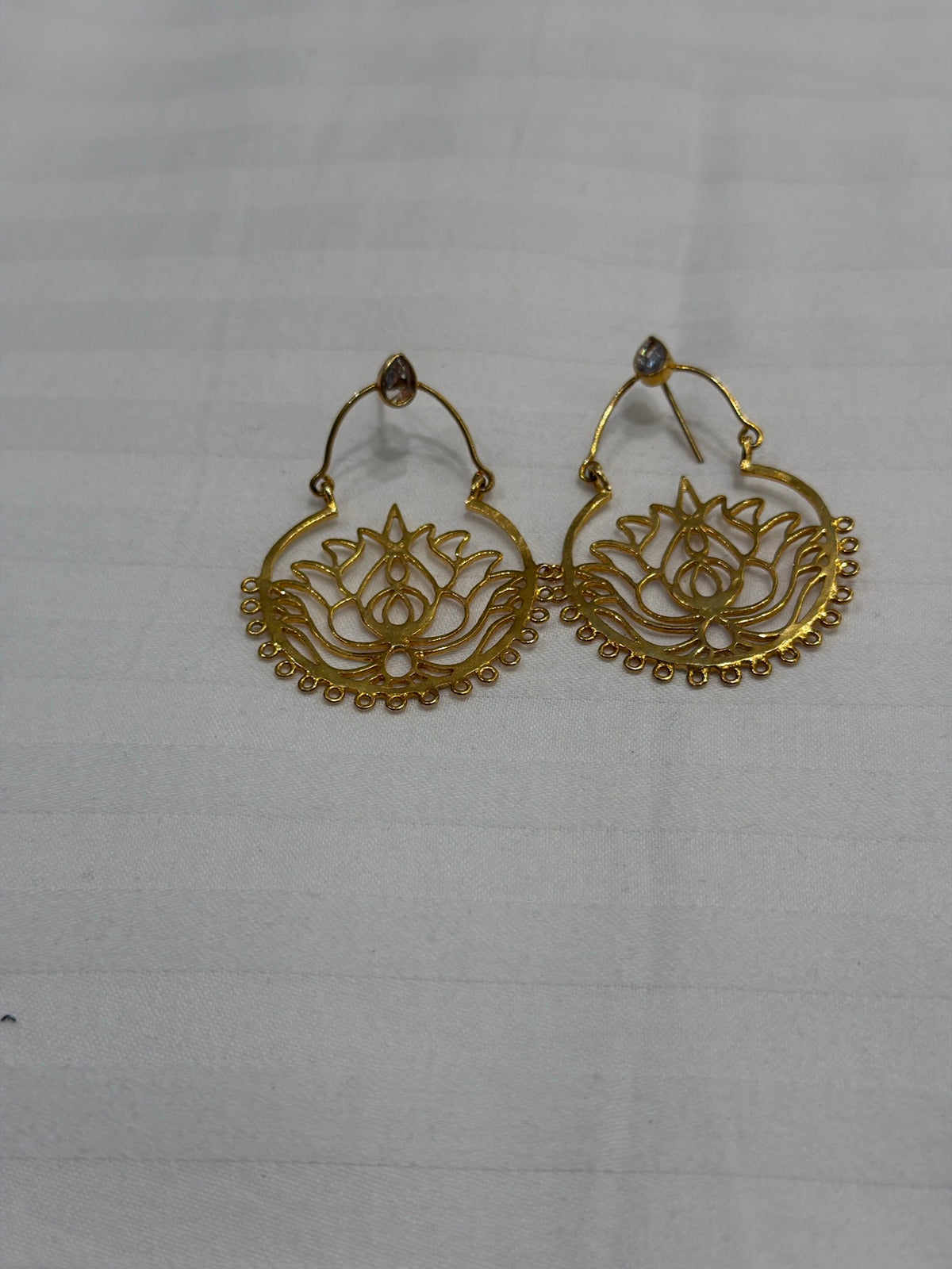 Nomi AM-34 — gold tone