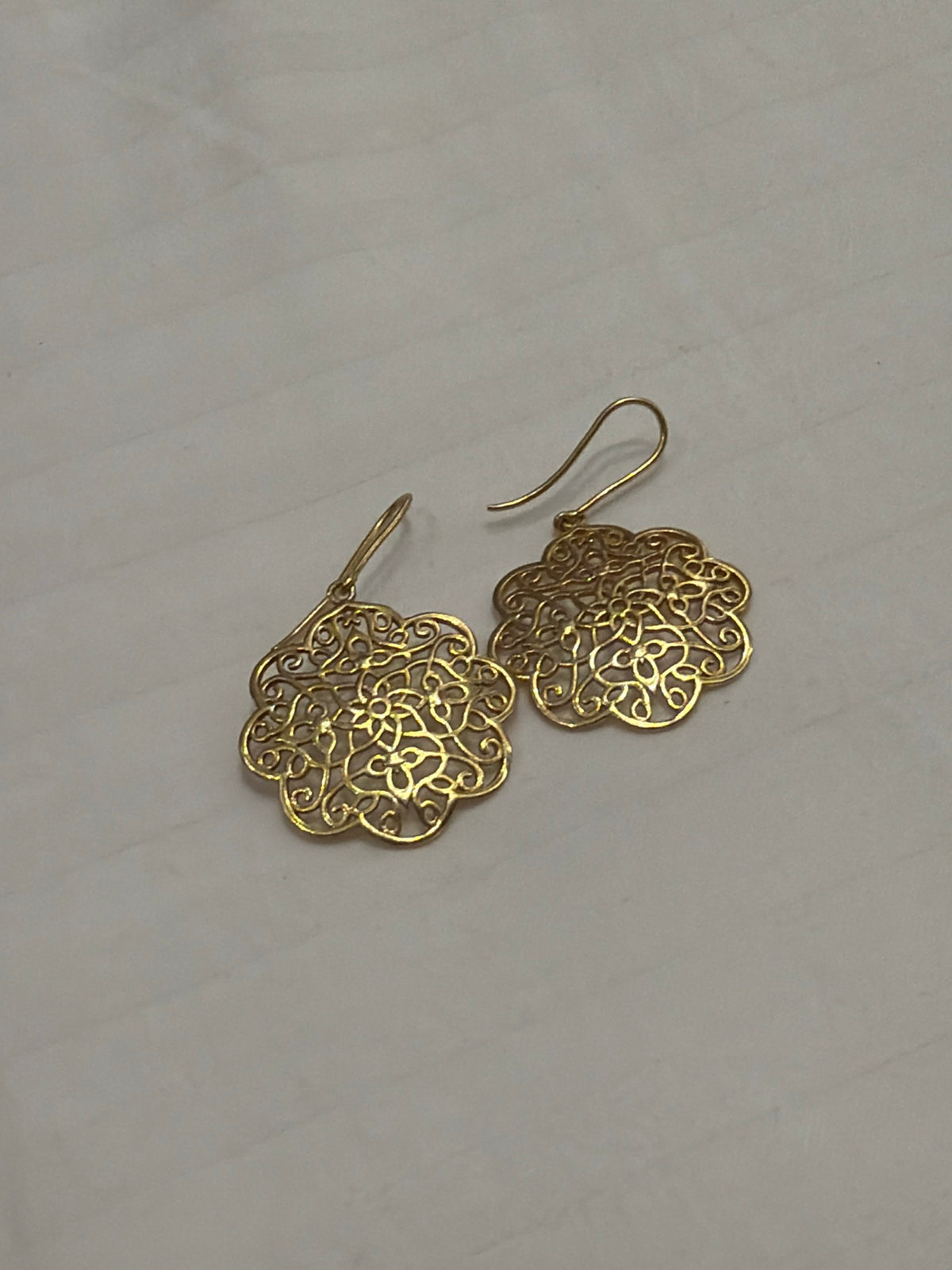 Nomi AM-36 — gold tone