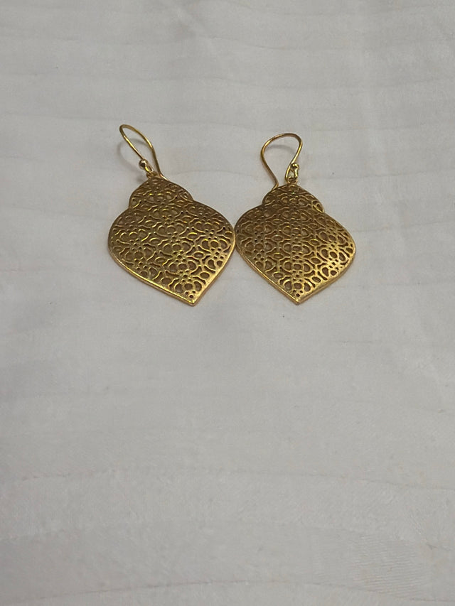 Nomi AM-37 — gold tone