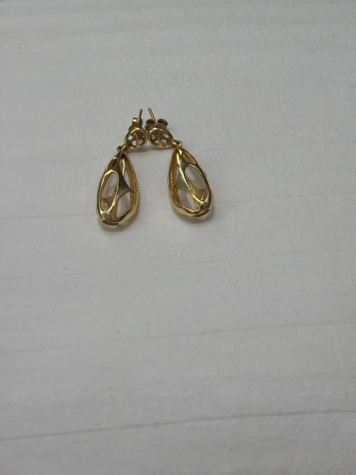 Nomi AM-47 — gold tone