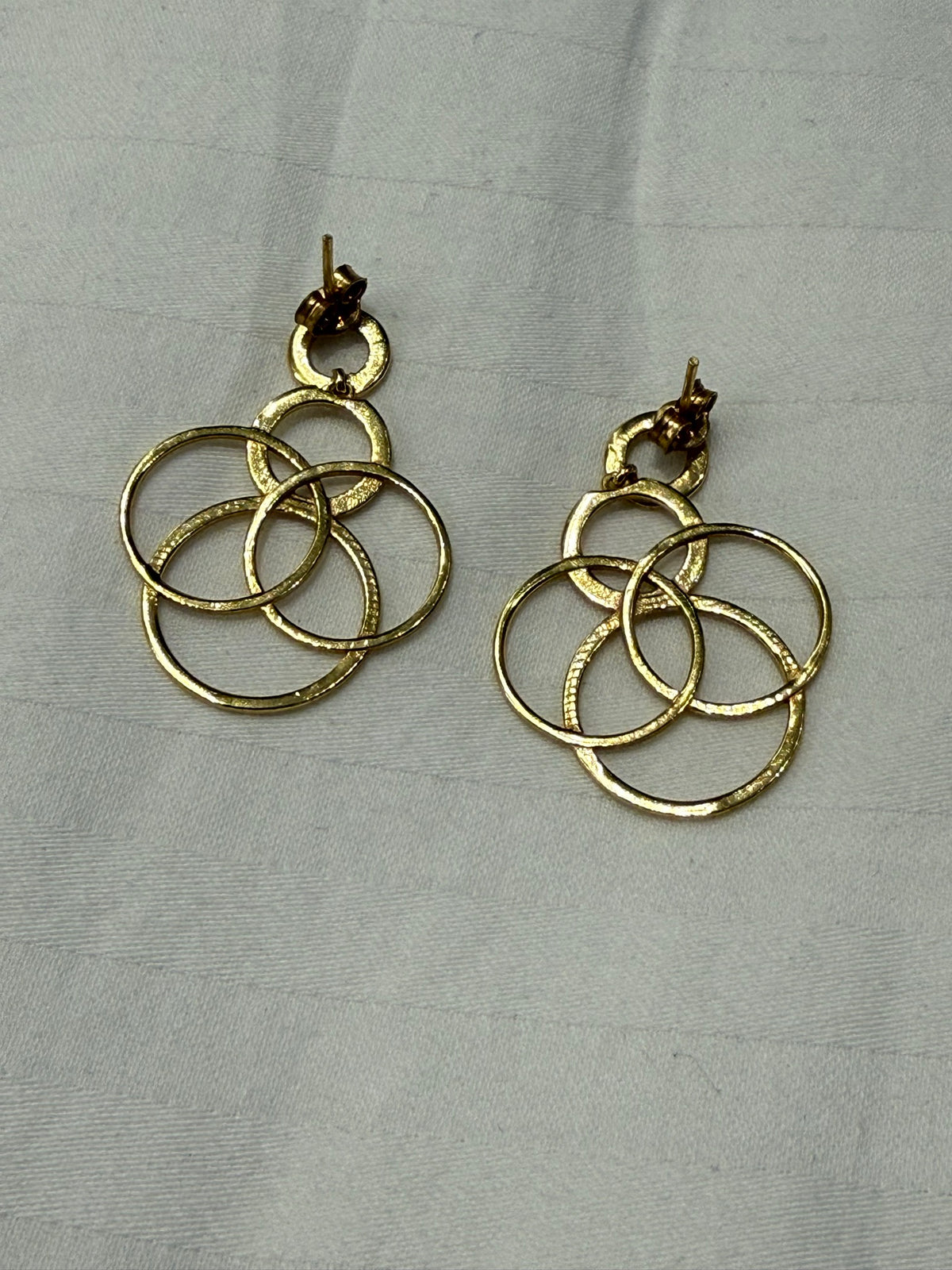 Nomi AM-05 — gold tone