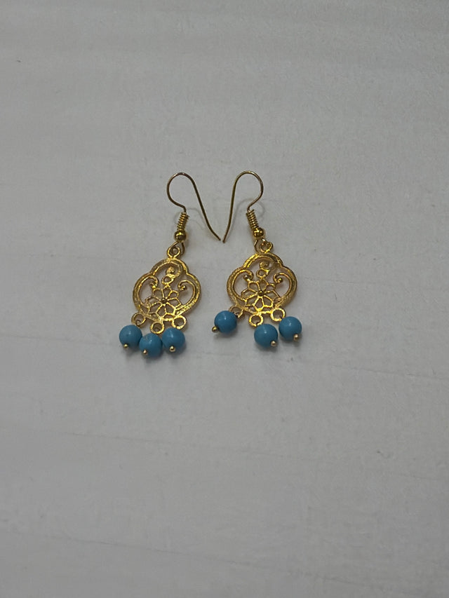 Nomi AM-53 — gold tone
