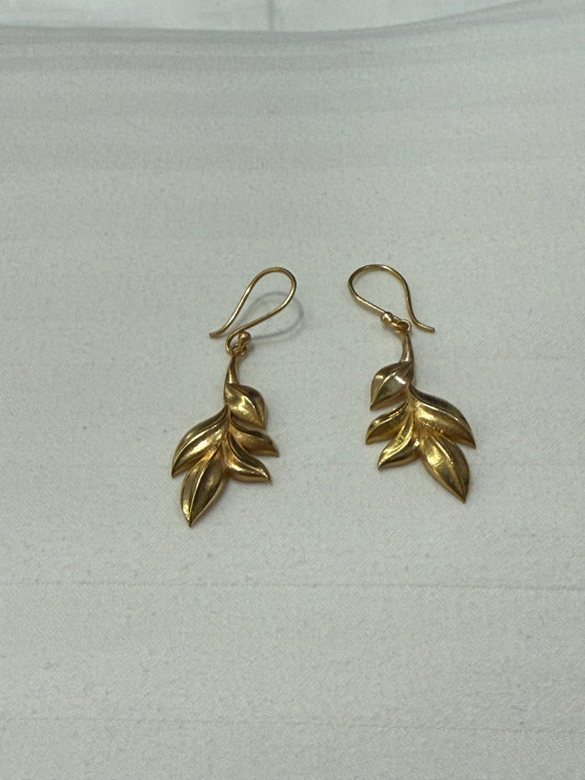 Nomi AM-54 — gold tone