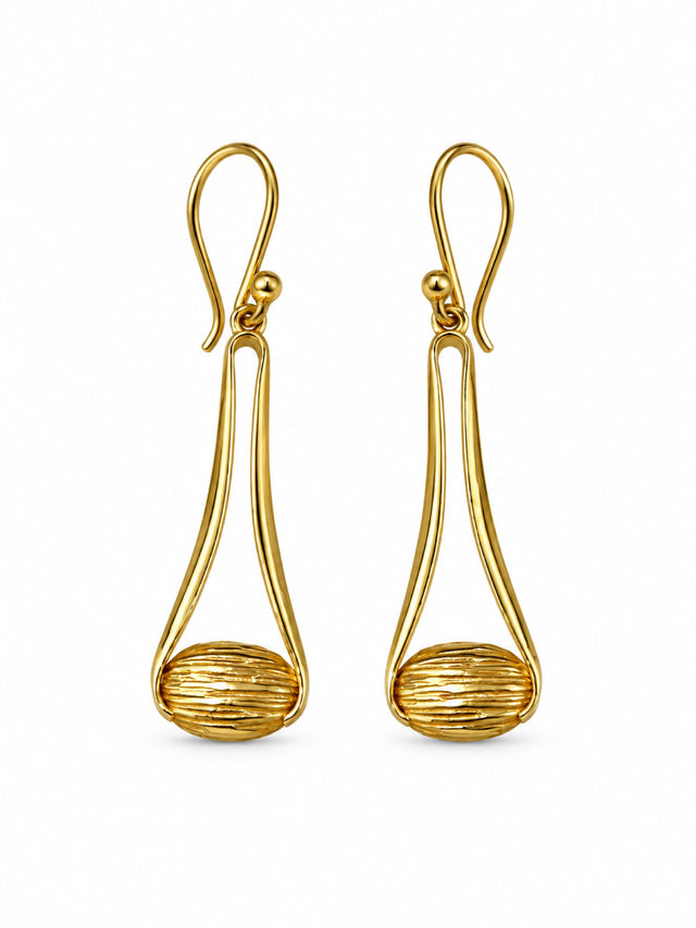 Nomi AM-57 — gold tone