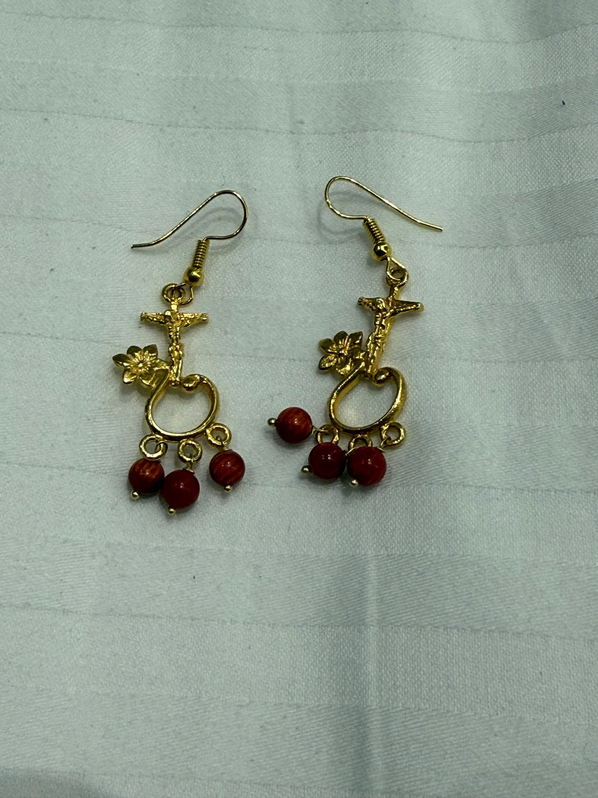 Nomi AM-60 — gold tone