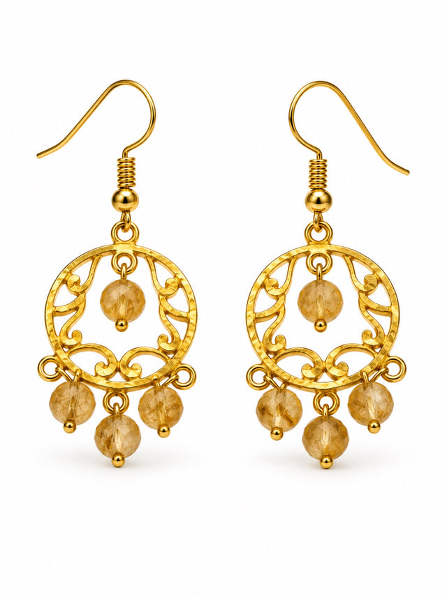 Nomi AM-67 — gold tone