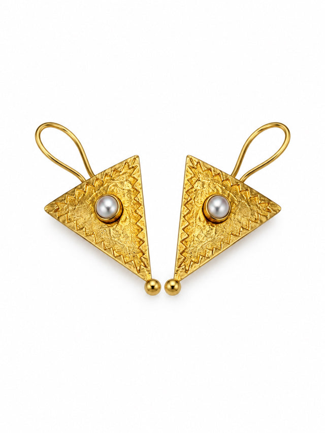 Nomi AM-68 — gold tone