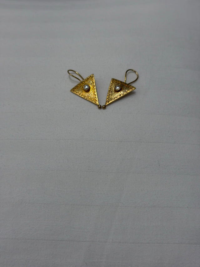 Nomi AM-68 — gold tone