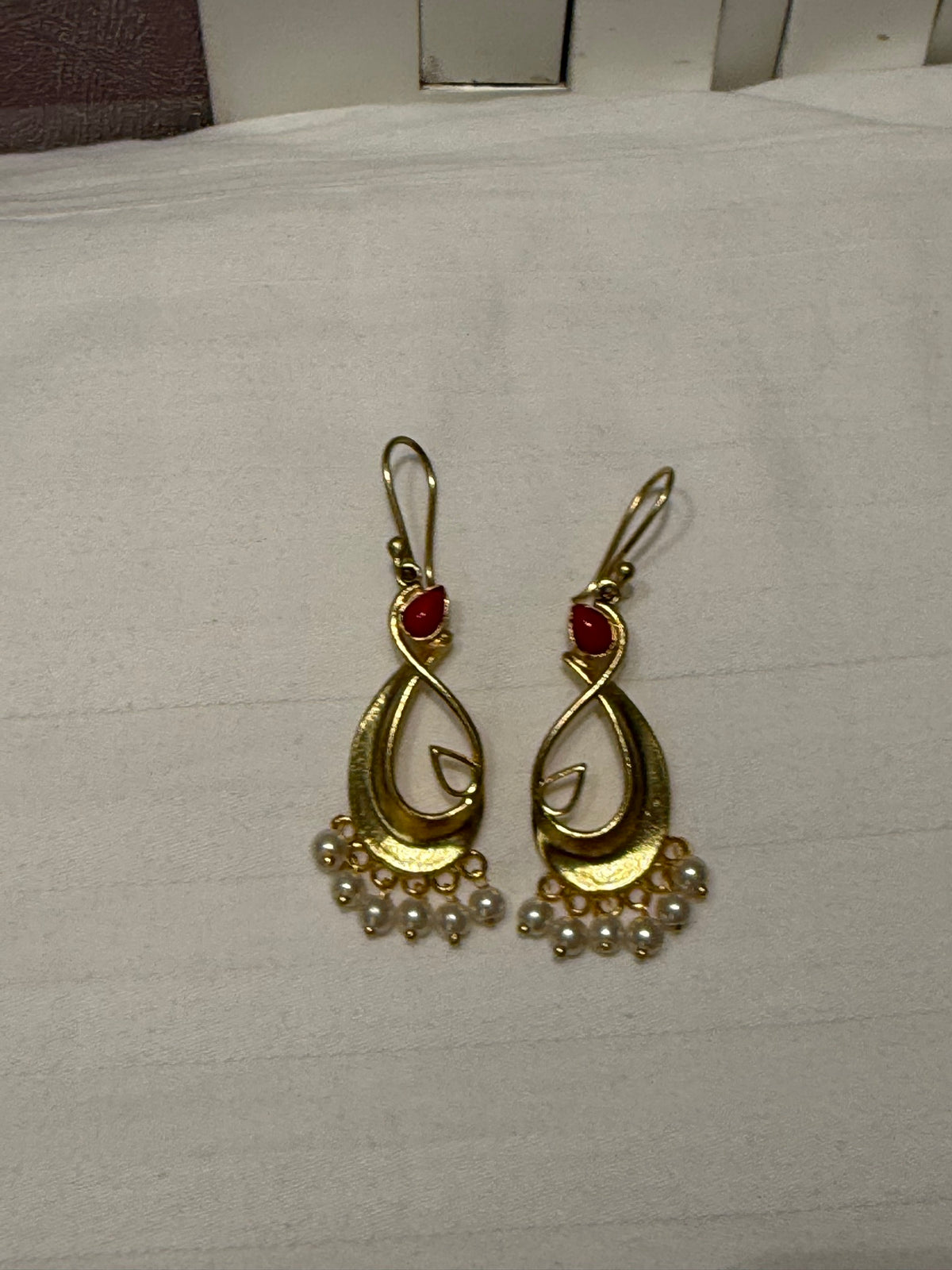 Nomi BH-04 — gold tone